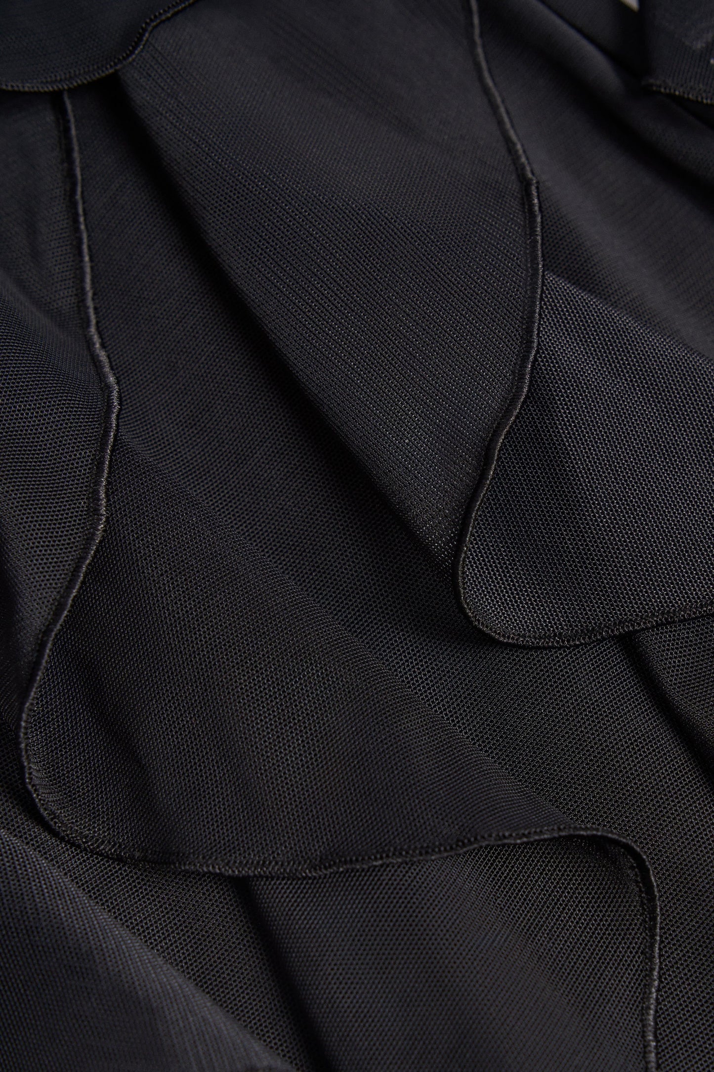 Ruffled Mid-Rise Flared Trousers in Black