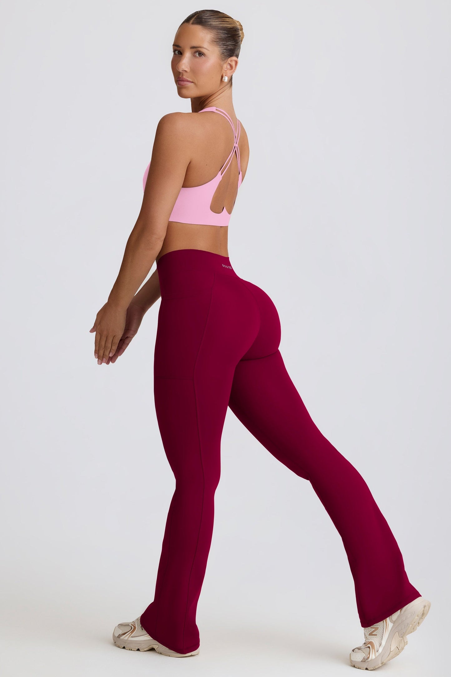 Soft Active Crossover Flared Trousers in Burgundy