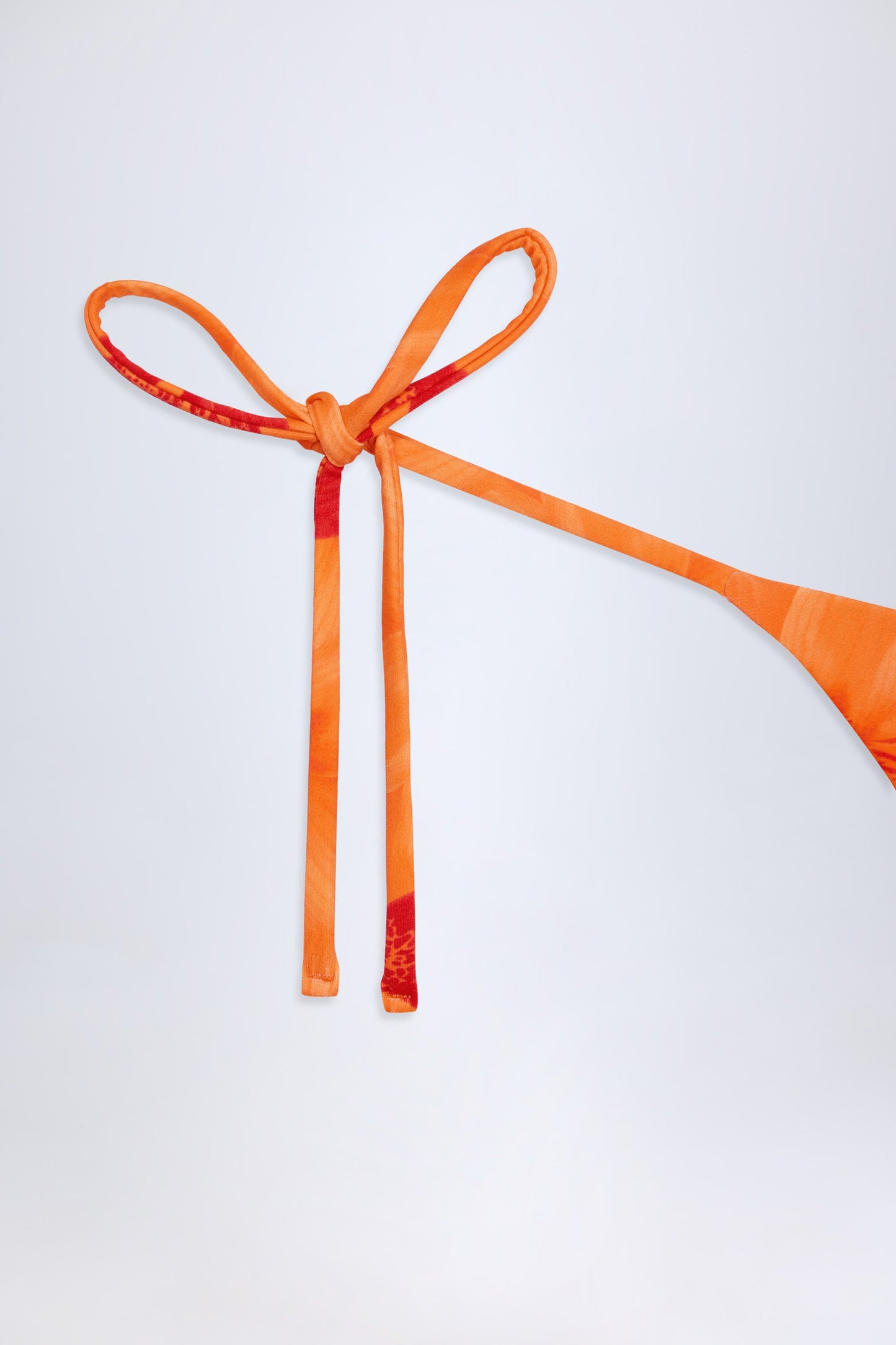 Side-Tie Thong Bikini Bottoms in Orange Orchid Print