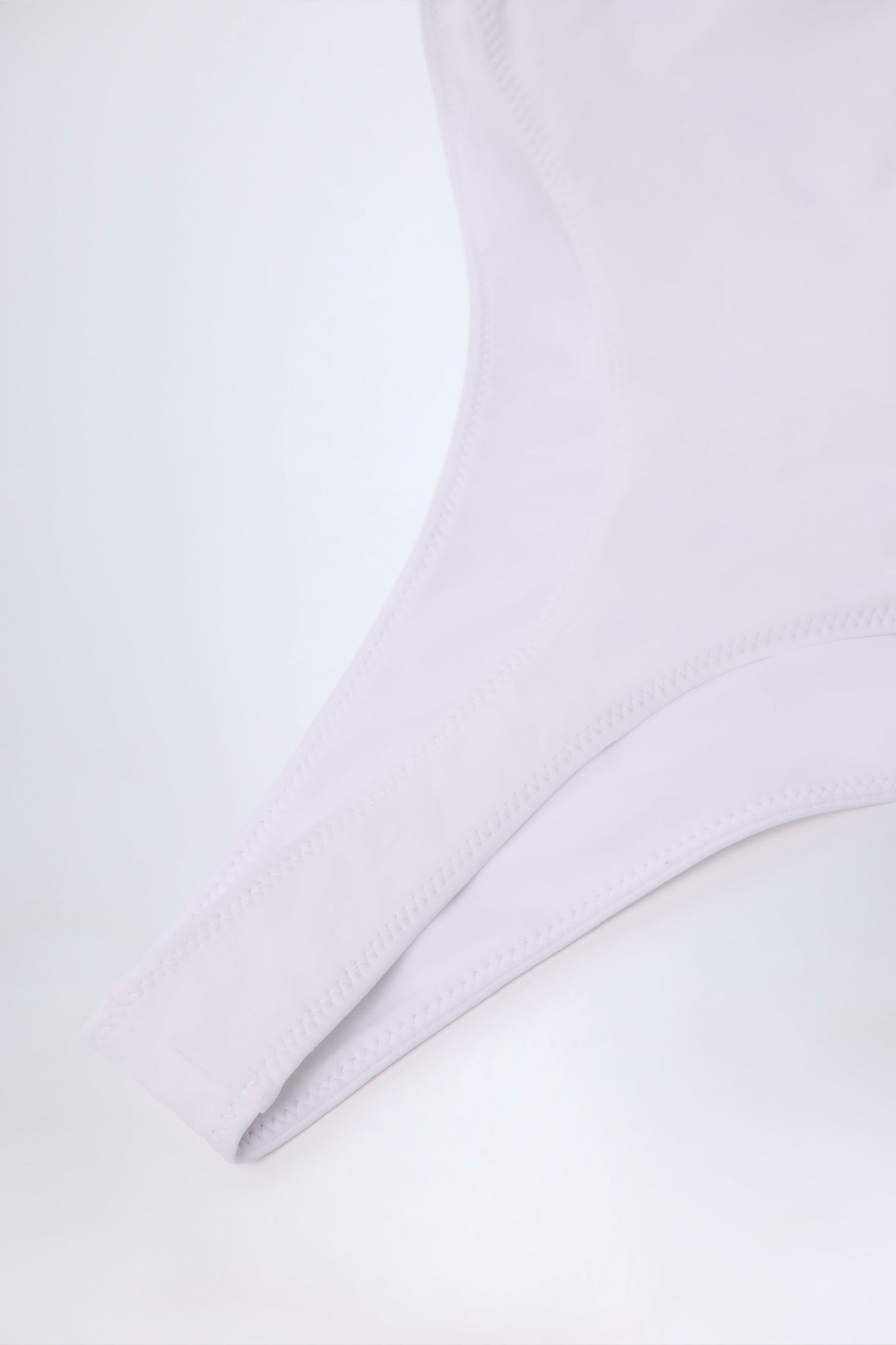 Ruffled Cut-Out Halterneck Swimsuit in White