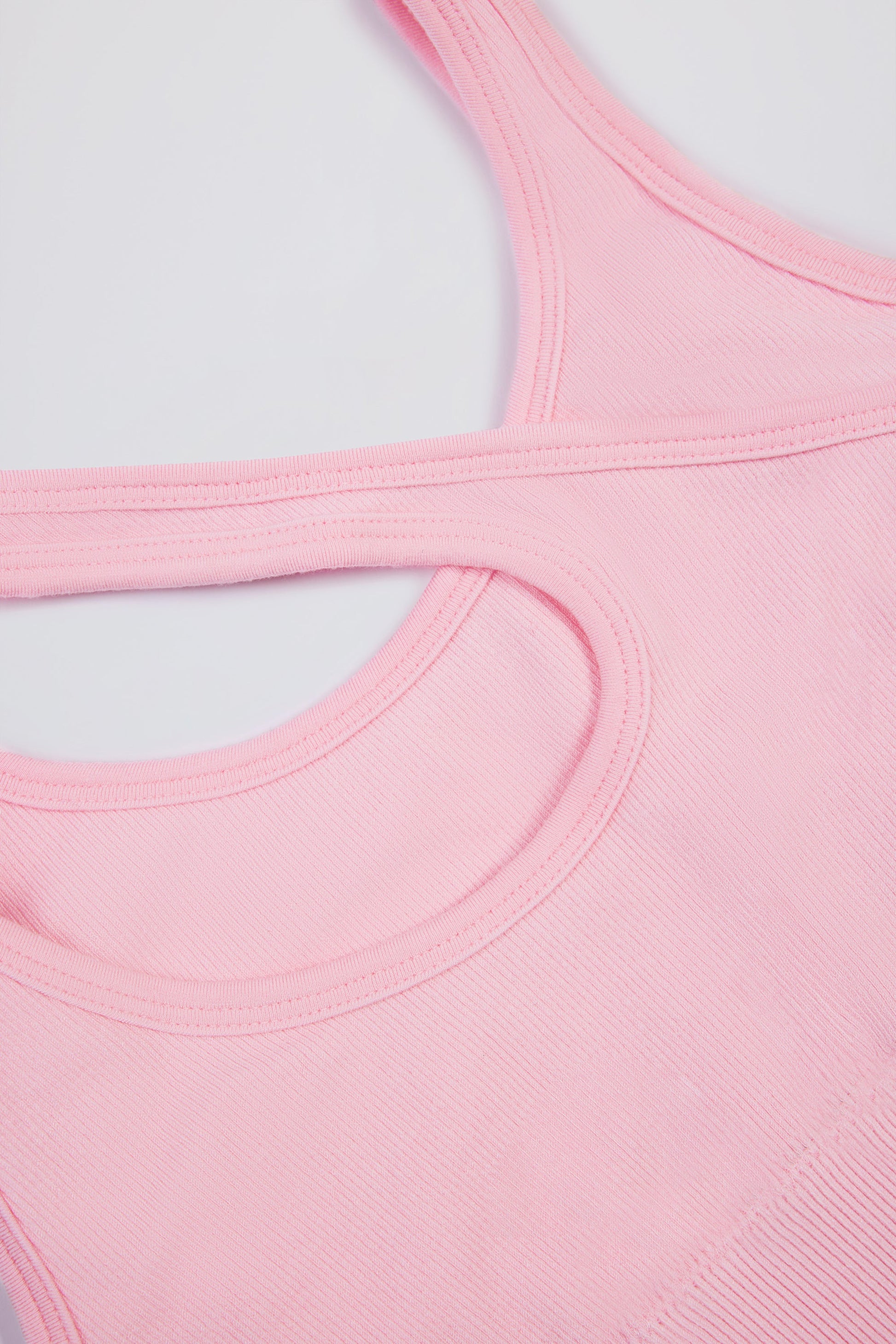 Seamless Soft Rib Asymmetric Sports Bra in Powder Pink