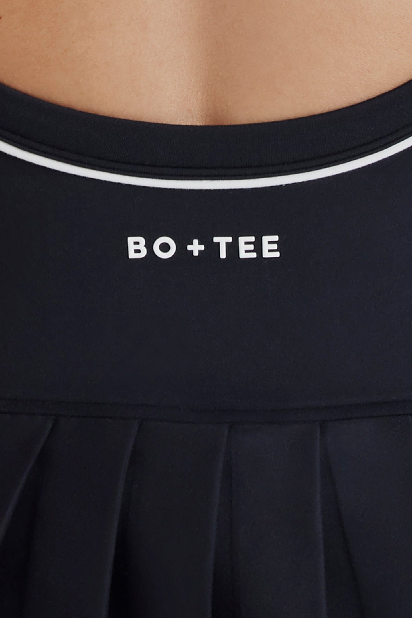 Soft Active Cross-Back Pleated Tennis Dress in Black