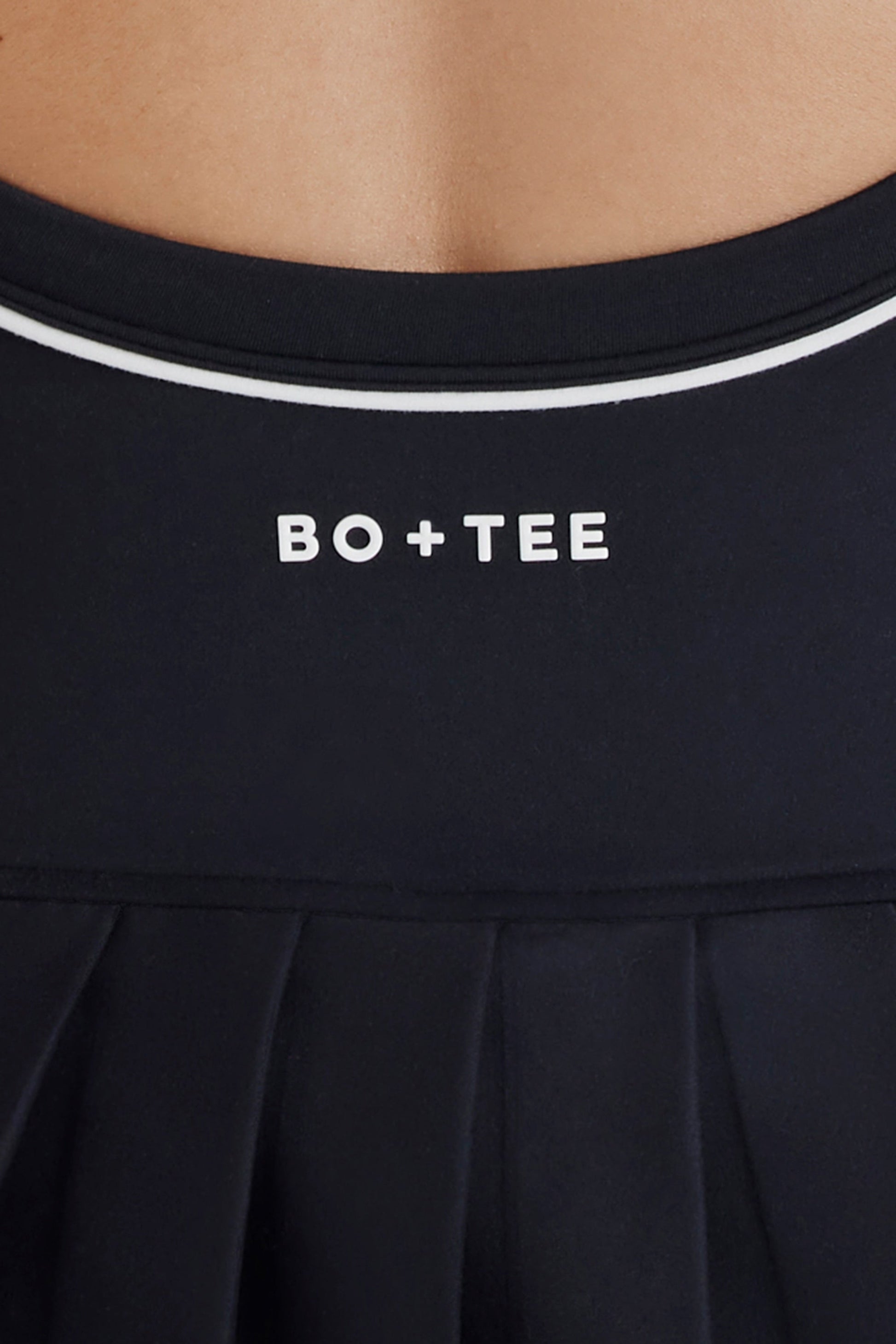 Soft Active Cross-Back Pleated Tennis Dress in Black