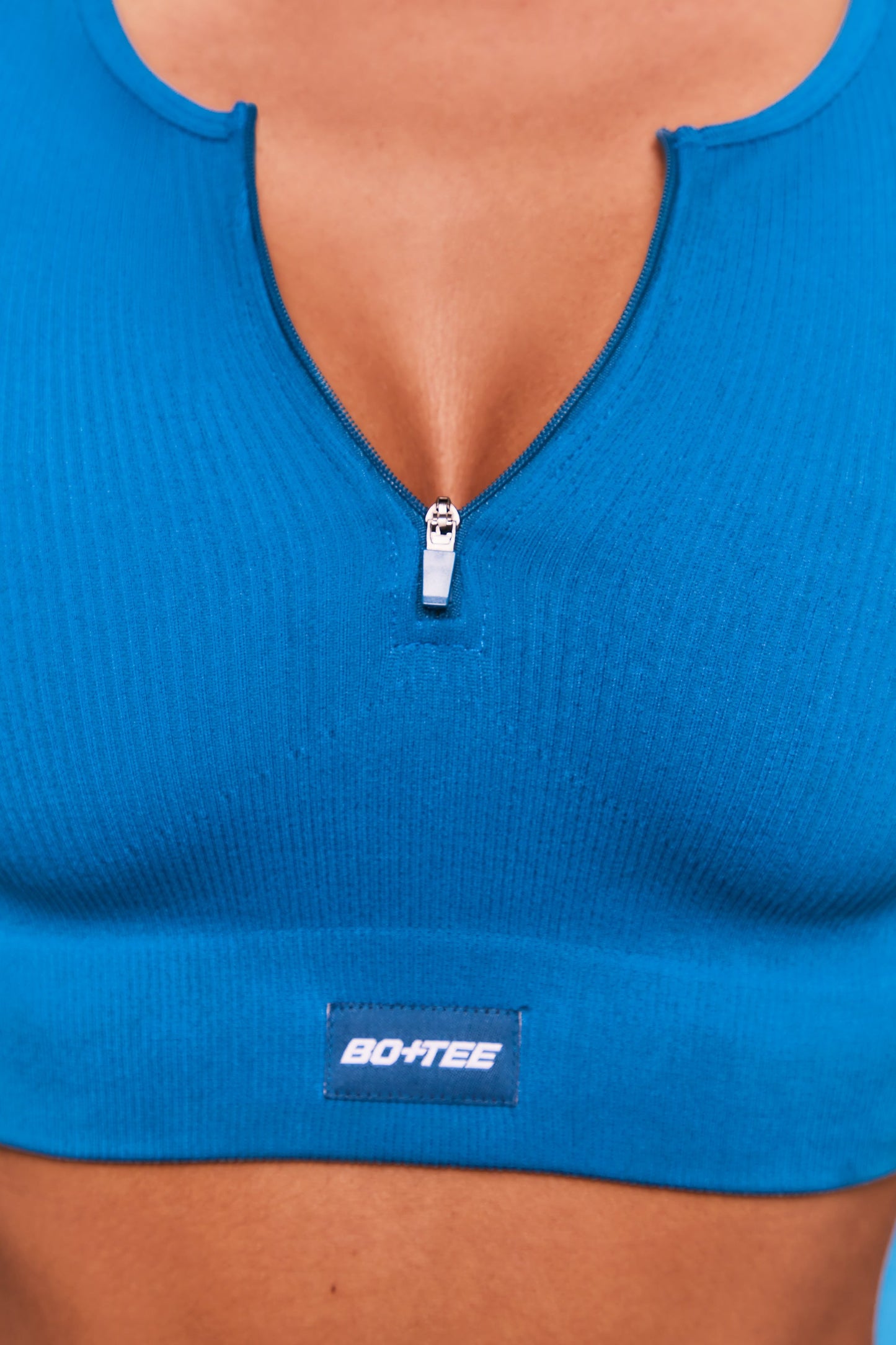 Ribbed Short Sleeve Zip Front Crop Top in Blue