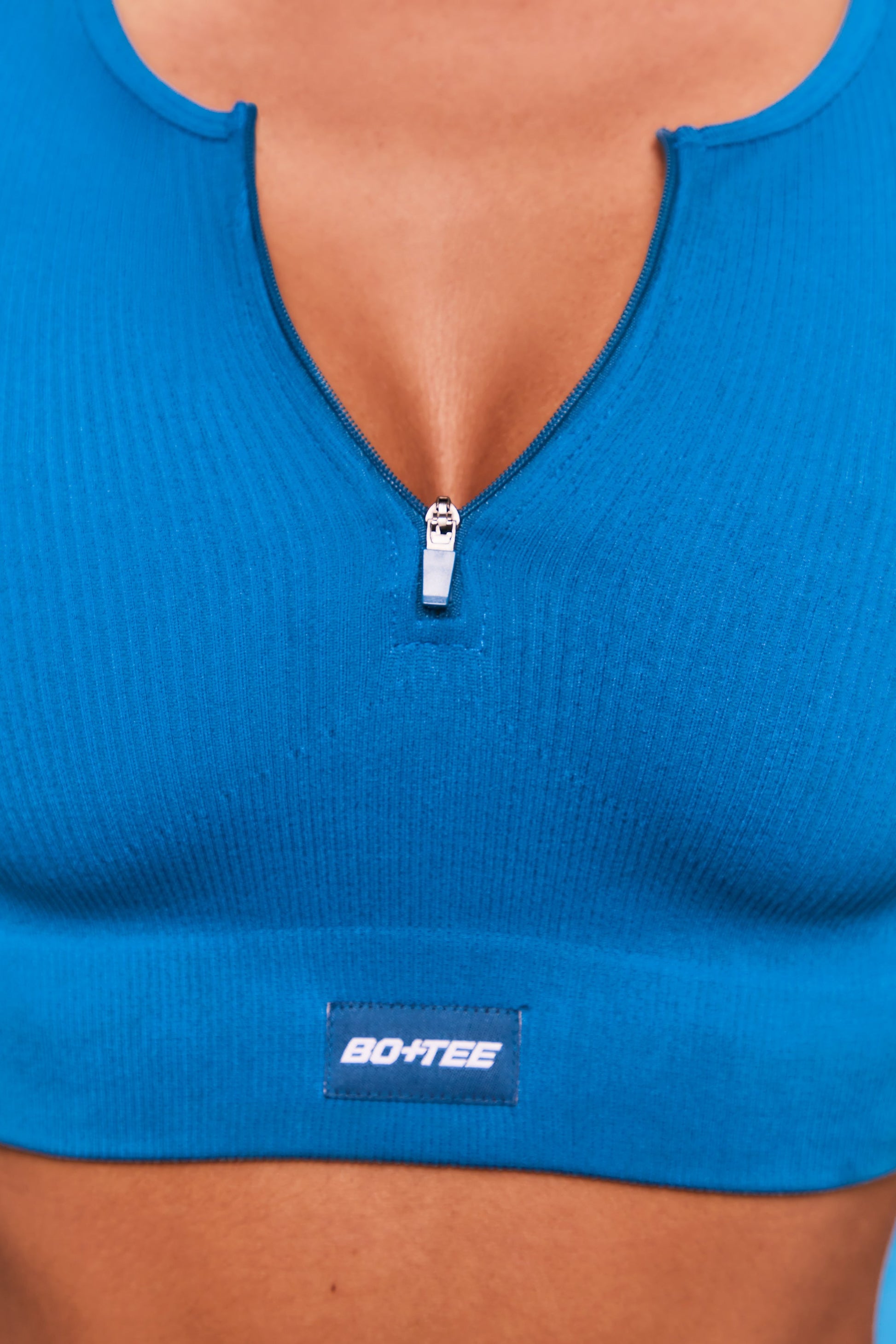 Ribbed Short Sleeve Zip Front Crop Top in Blue