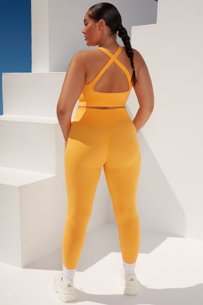 Cross Back Strap Sports Bra in Light Orange