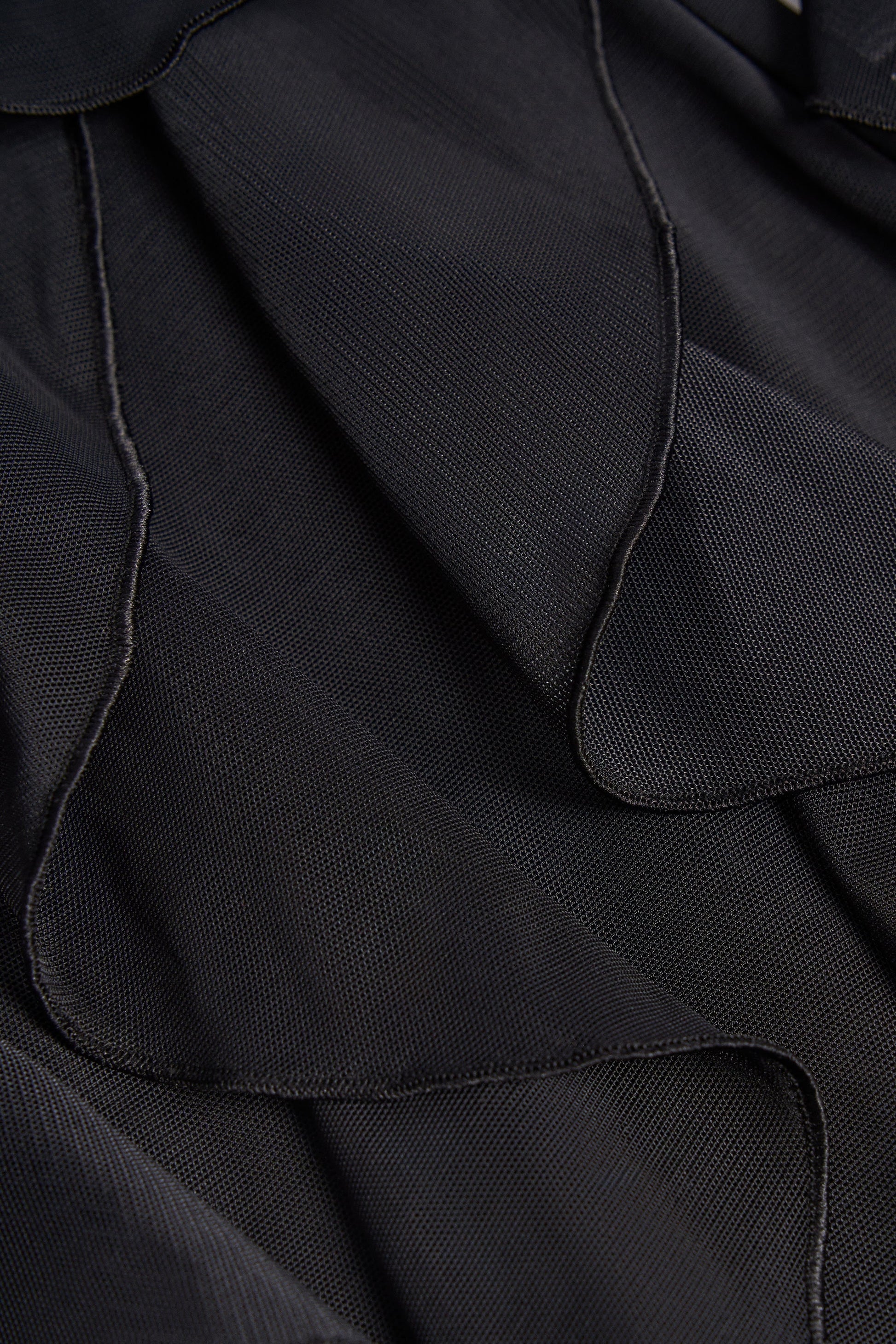 Ruffled Mid-Rise Flared Trousers in Black