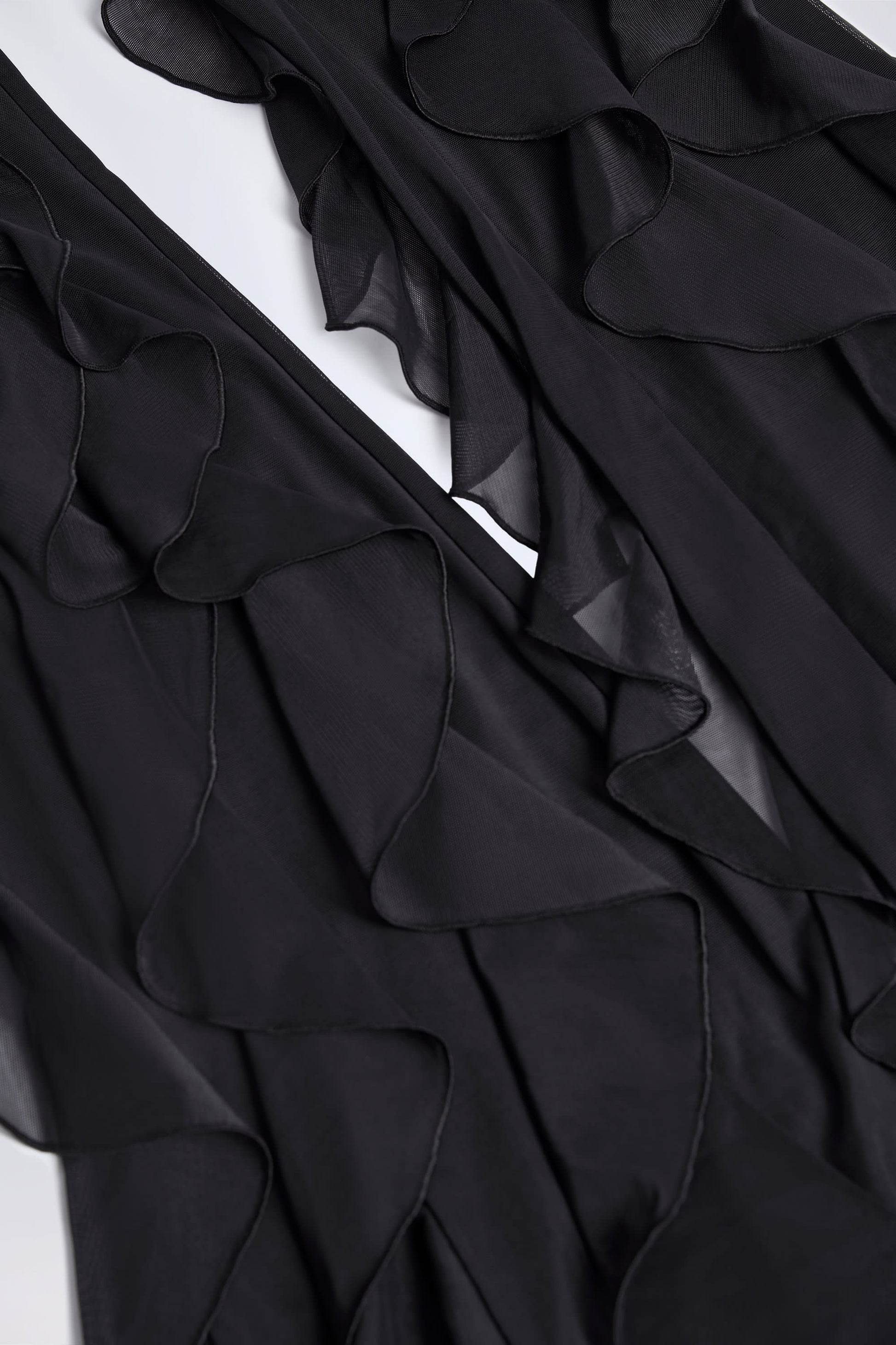 Ruffled Mid-Rise Flared Trousers in Black