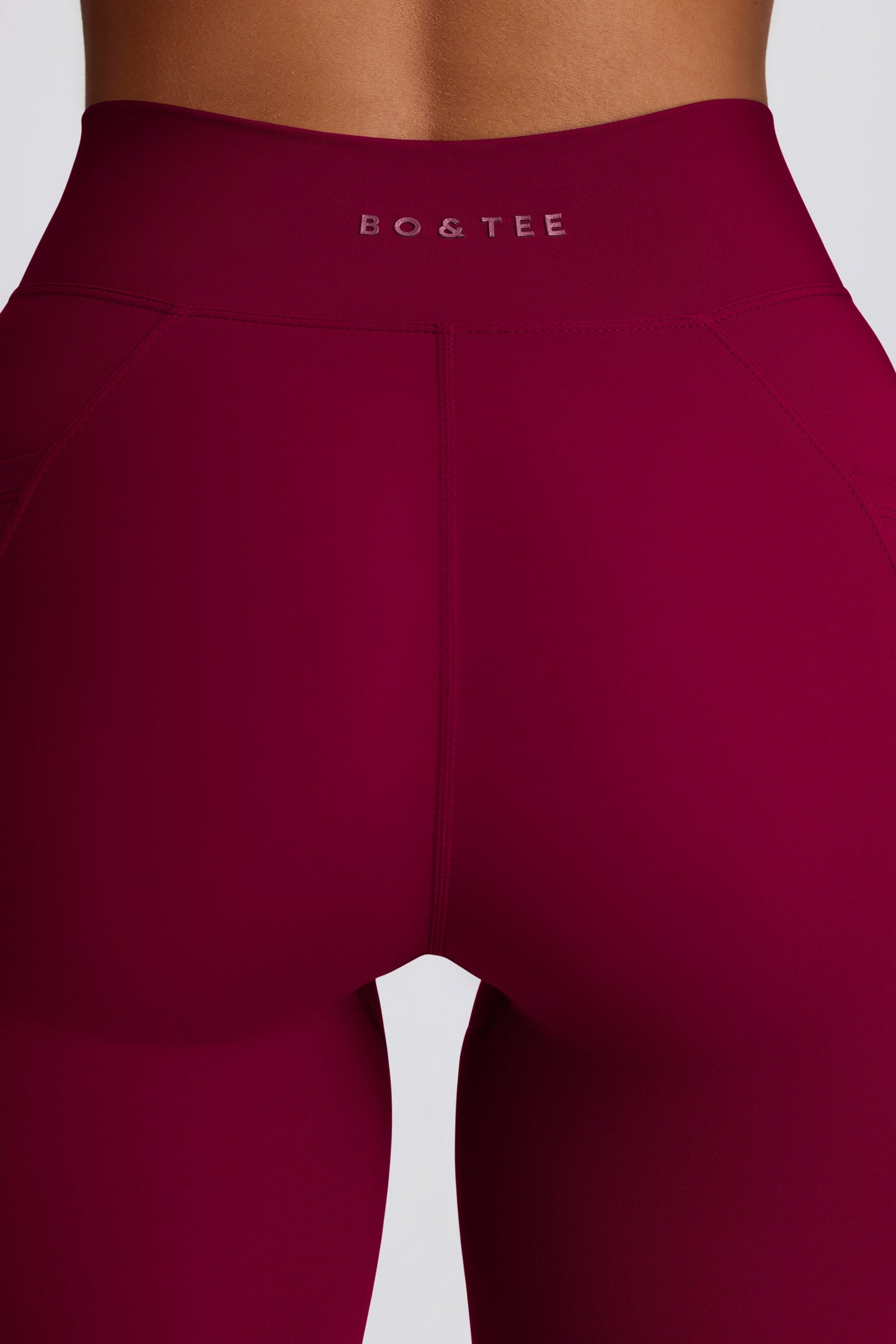 Soft Active Crossover Flared Trousers in Burgundy