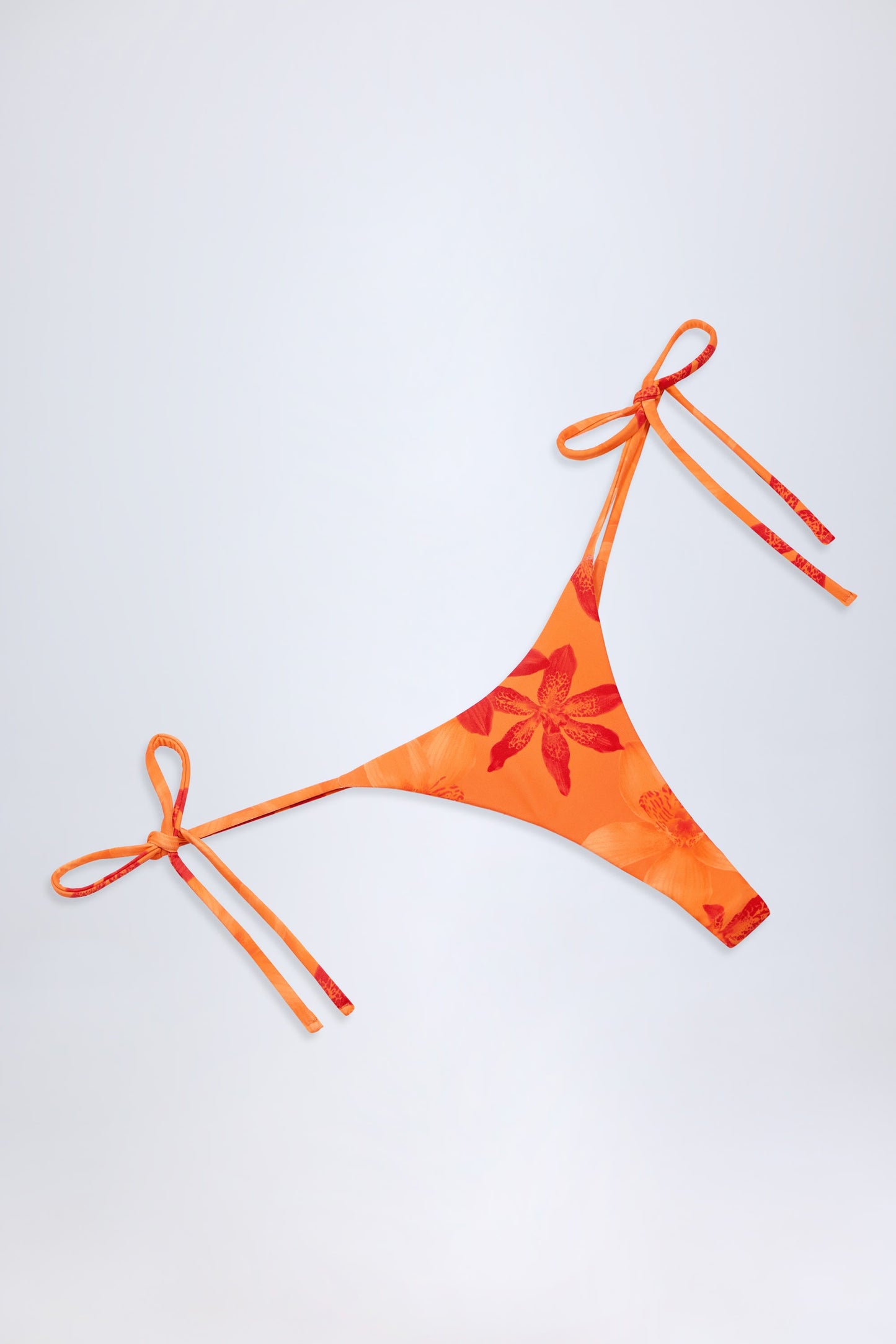 Side-Tie Thong Bikini Bottoms in Orange Orchid Print