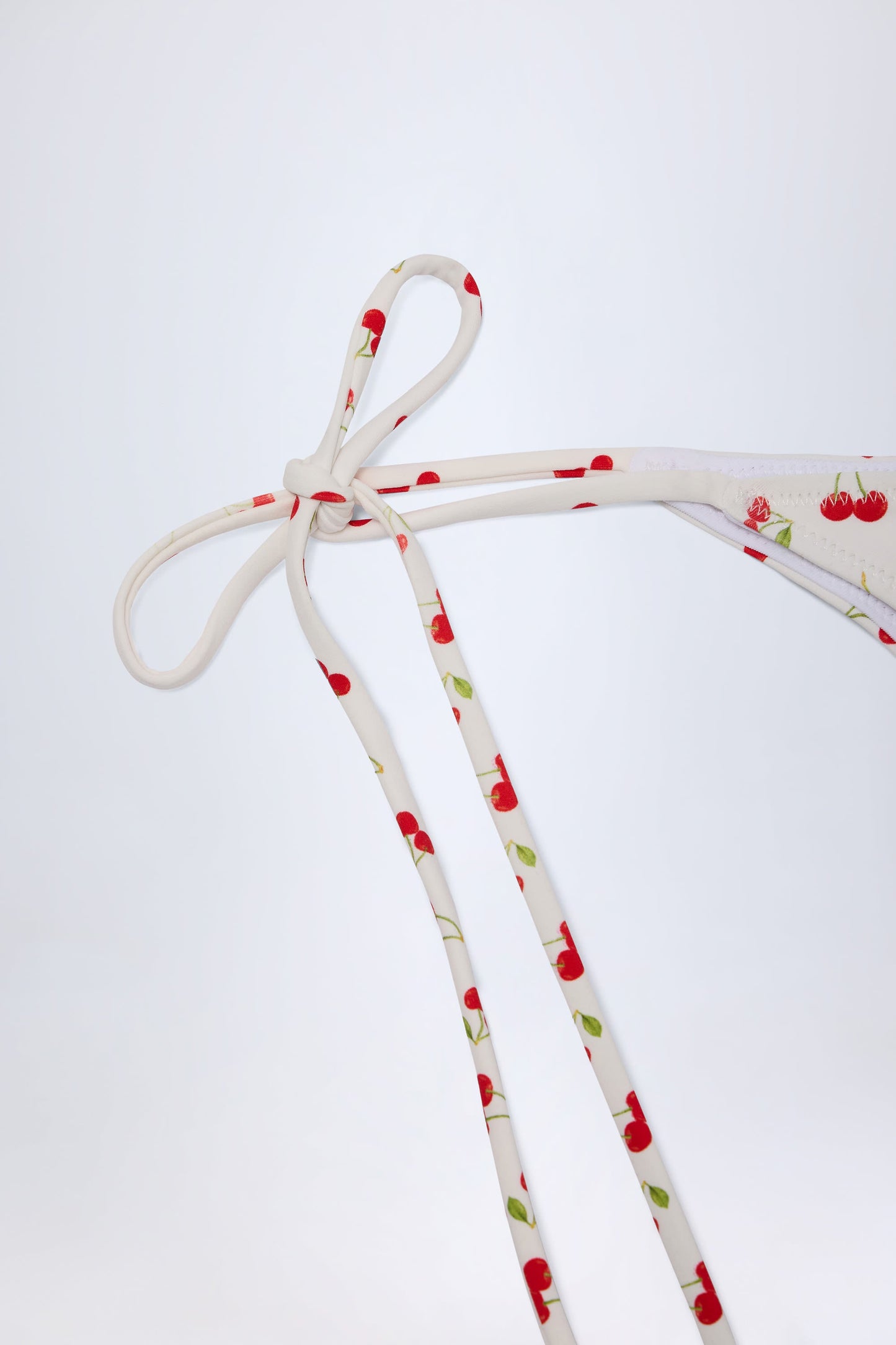 Side-Tie Cheeky Bikini Bottoms in Cherry Print