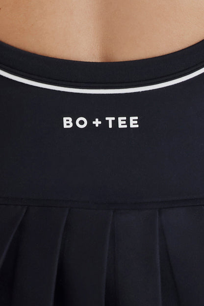 Soft Active Cross-Back Pleated Tennis Dress in Black
