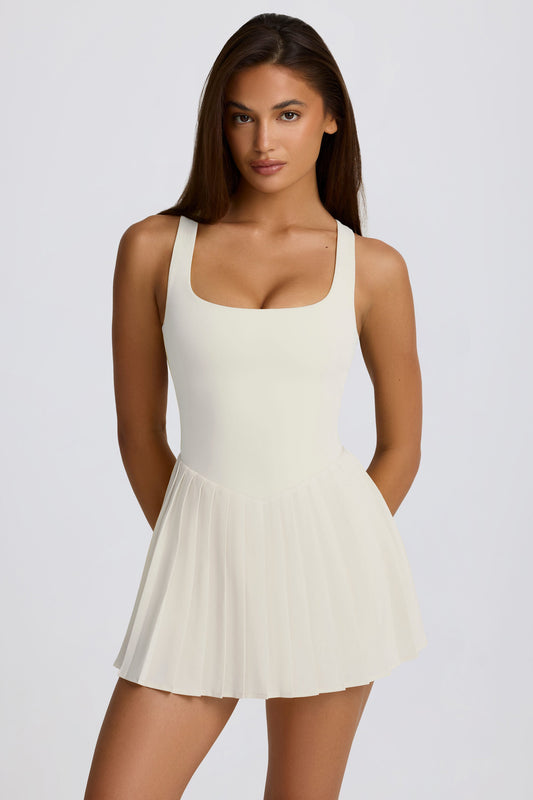 Soft Active Open-Back Pleated Tennis Dress in Ivory