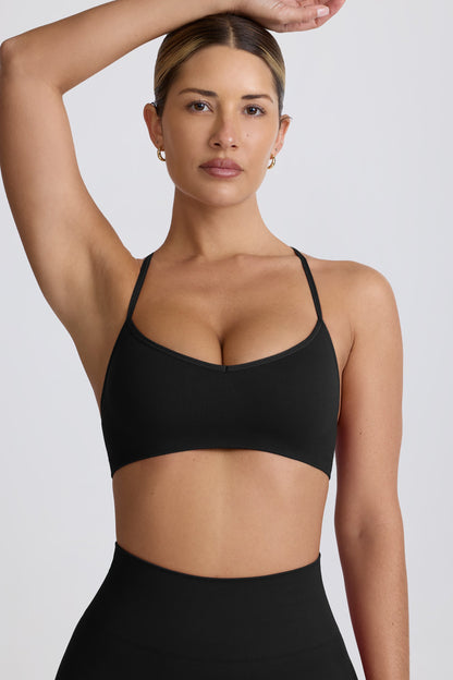 Super Sculpt Seamless Cross-Back Sports Bra in Black